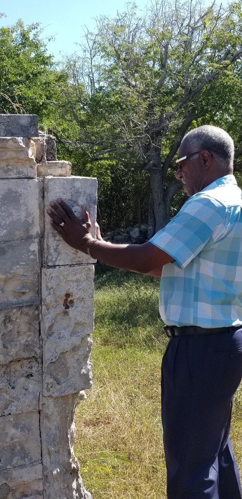 Kendal Nixon tends a monument 